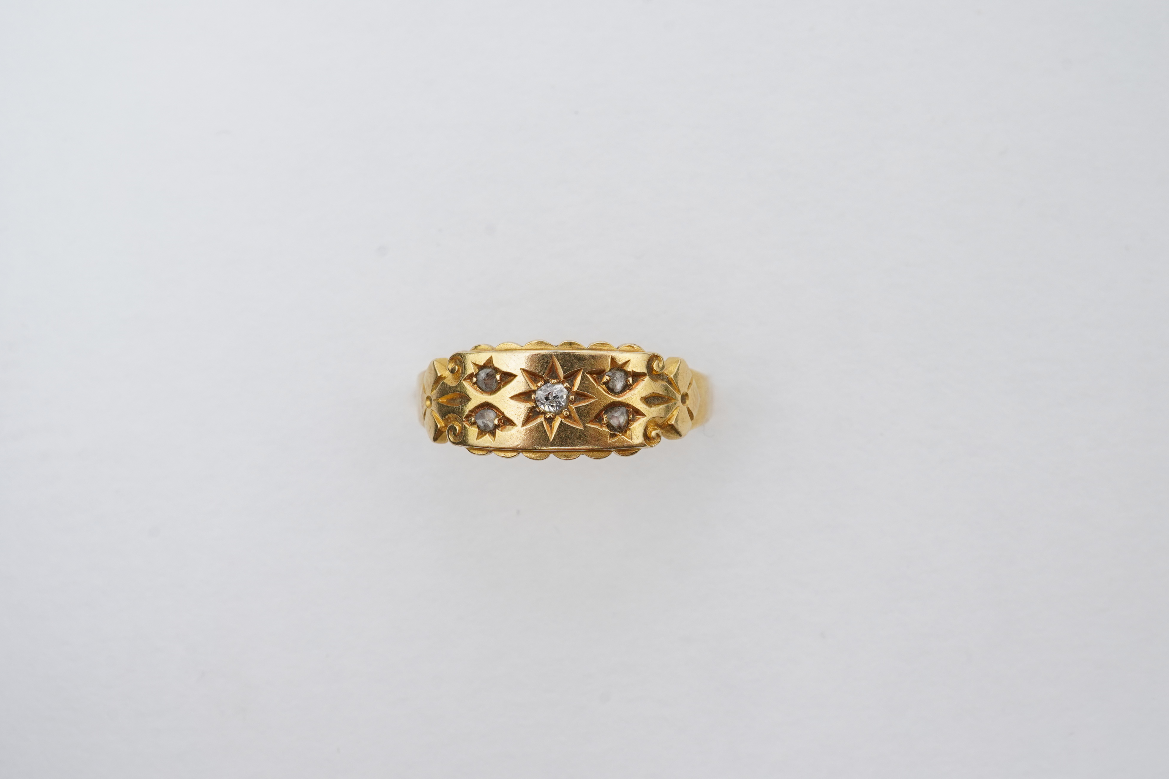 An Edwardian gold and diamond ring, circa 1910
